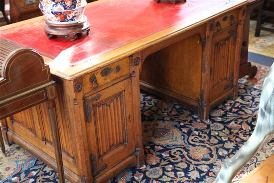 Gillows after a design by A.W.N.Pugin. A Victorian gothic revival oak desk, W. 5ft. D. 2ft 6in. H.2ft 6in.